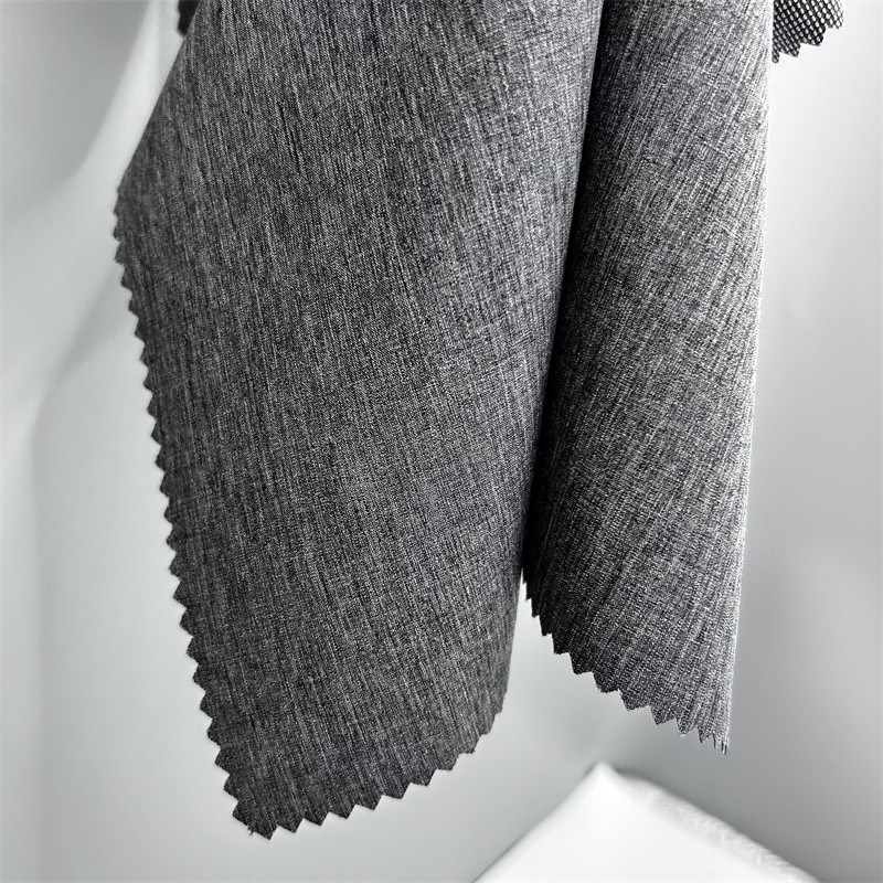 ডাবল টোন পার্ল ডট ক্যাটিওনিক পলিস্টার ফ্যাব্রিক চারটি উপায় প্রসারিত শণীর মতো টেক্সচার সহ পৃষ্ঠের উপর